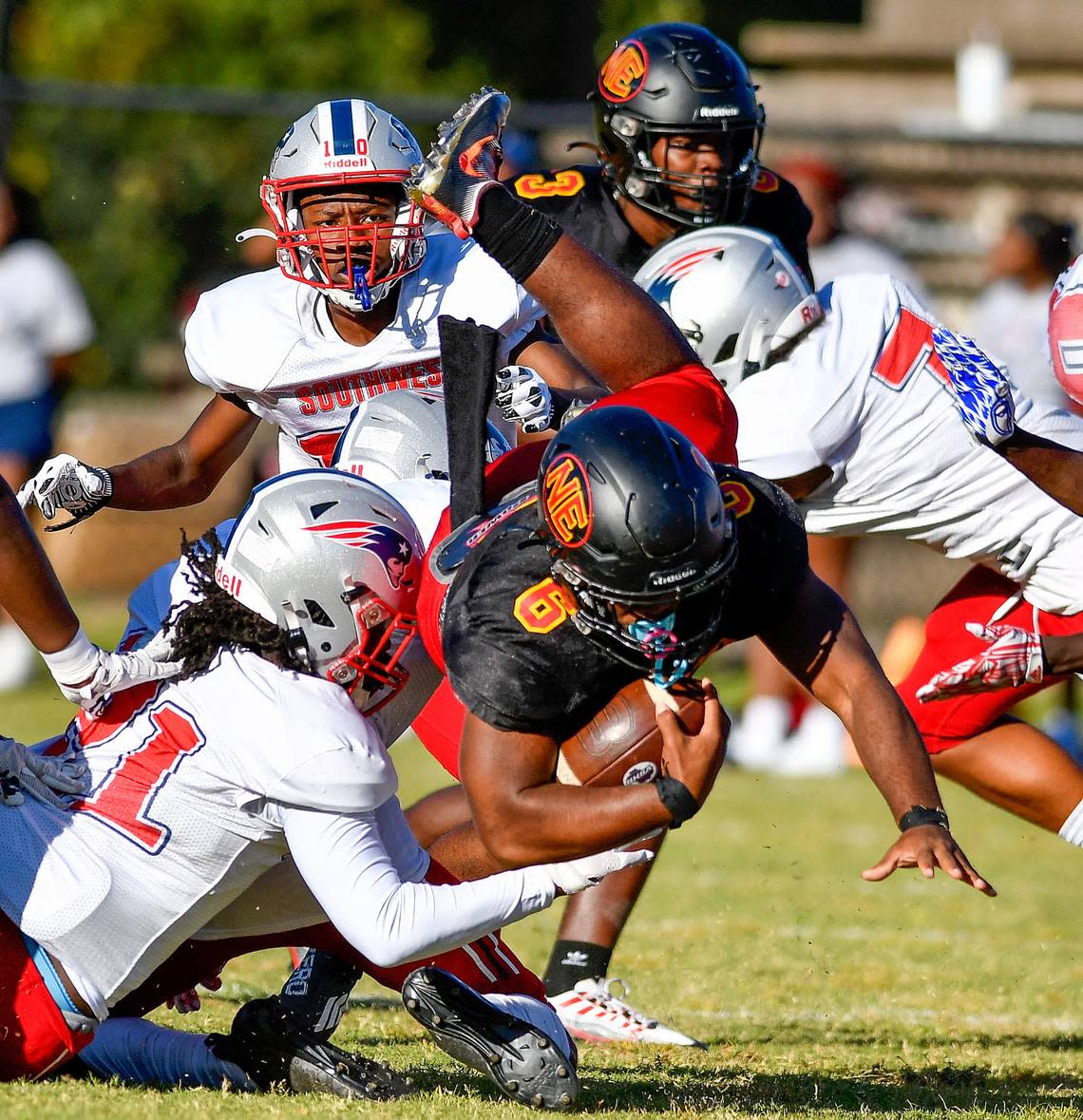 Northeast running back Nick Woodford (6) dives for a first down during the Raiders’ game against Southwest Friday night.