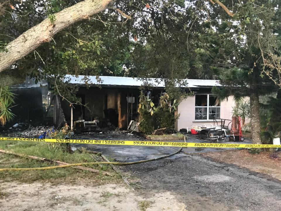 Indian River County fire officials and detectives are investigating a house fire in the 500 block of Caribbean Circle, off Old Dixie Highway Southwest after witnesses captured video that shows a man pour liquid from a red canister on the home and walk away as it erupts into flames on Tuesday, Dec. 7, 2021.