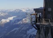 View of the 'Step into the Void' installation at the Aiguille du Midi mountain peak above Chamonix, in the French Alps, December 17, 2013. REUTERS/Robert Pratta