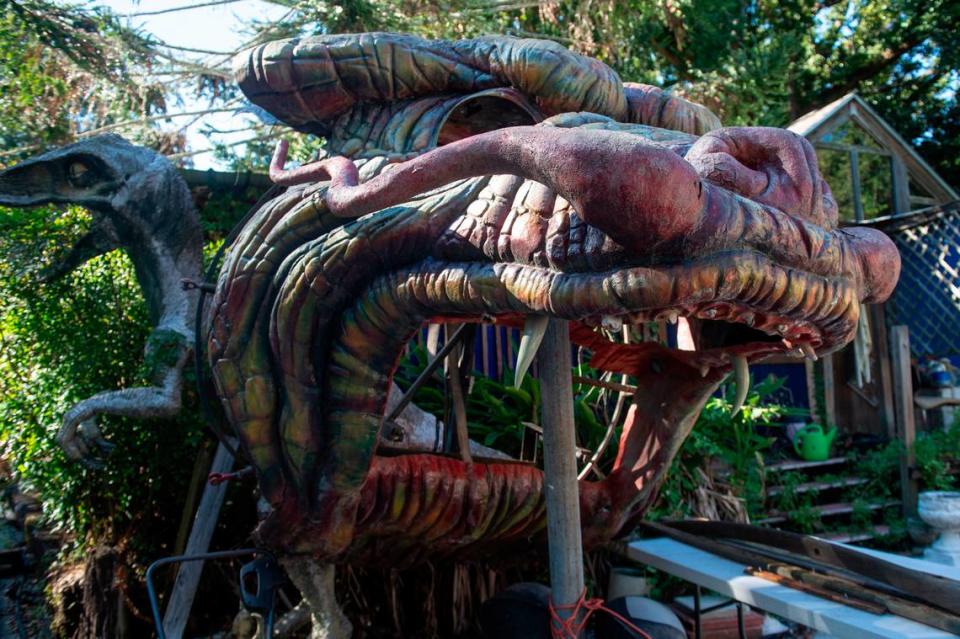 The dragon from the former Lady Luck Casino sits in Frank and Marlene Gann’s backyard on Tuesday, Oct. 17, 2023. The Ganns affectionately refer to her as “Naga.”