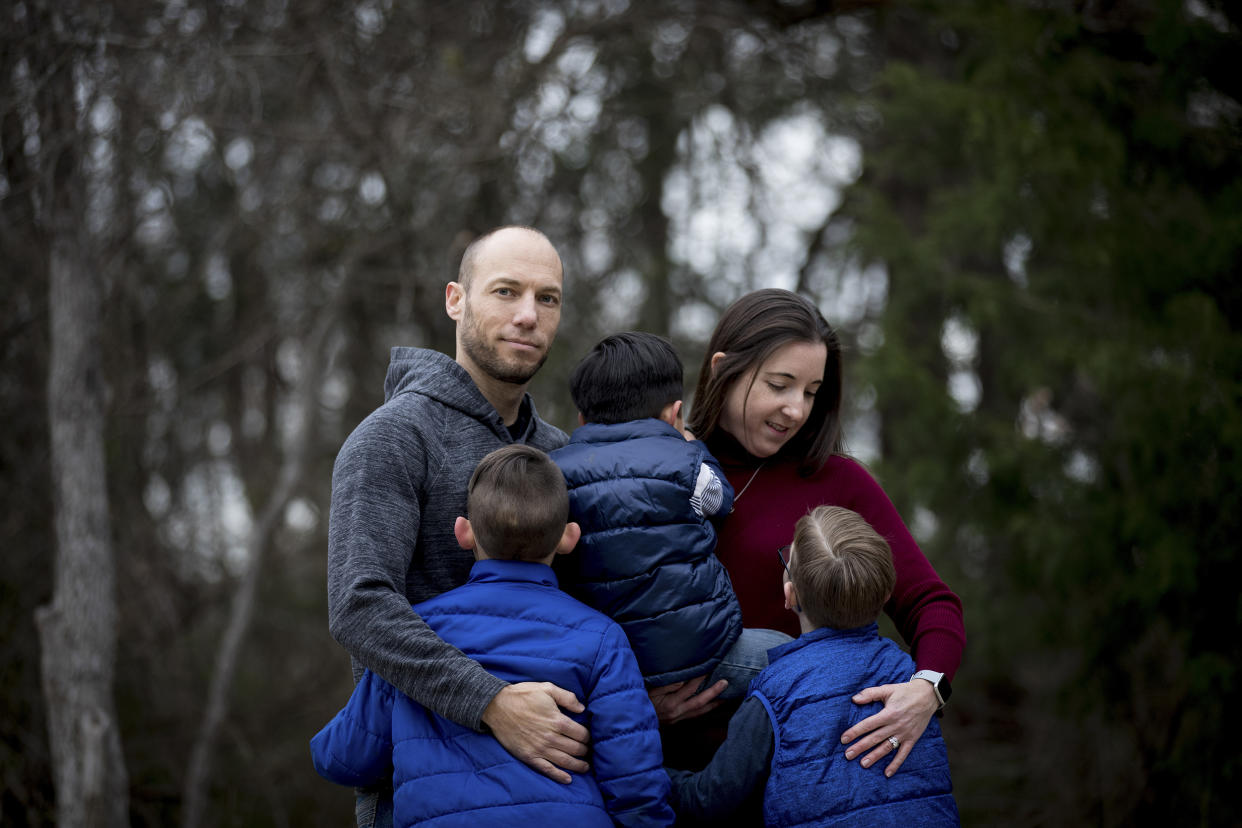Chad and Jennifer Brackeen with their two biological children and Zachary, center, a Native American boy at the center of a court battle, at home near Fort Worth, Texas, (Allison V. Smith for The New York Times via Redux file)