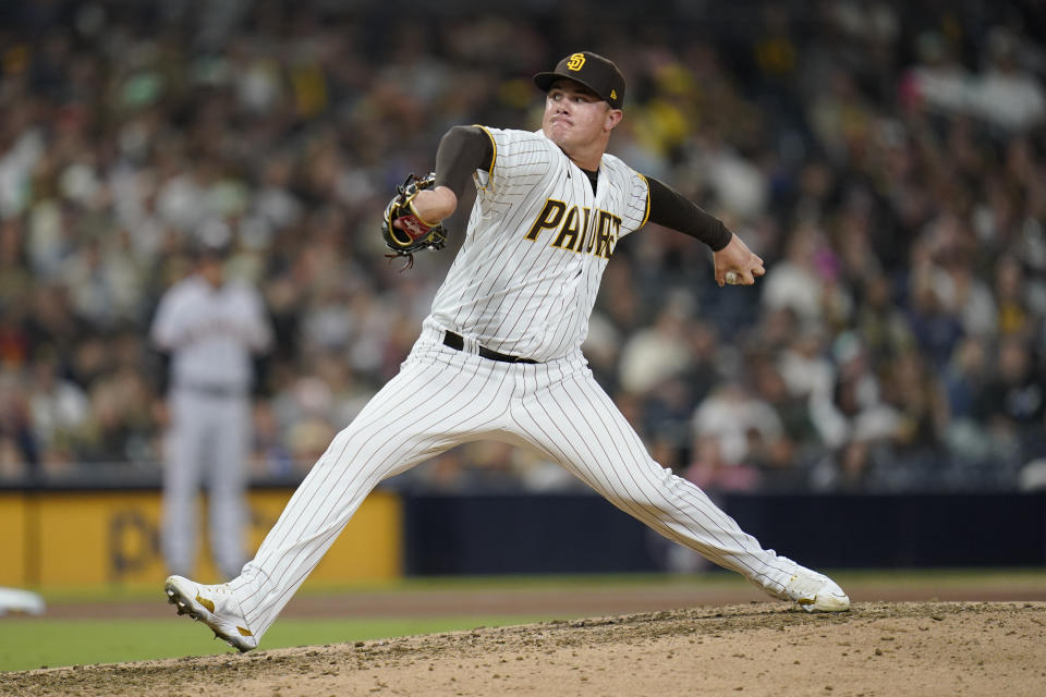 San Diego Padres relief pitcher Adrian Morejon works against a San Francisco Giants batter during the seventh inning of a baseball game Monday, Oct. 3, 2022, in San Diego. (AP Photo/Gregory Bull)