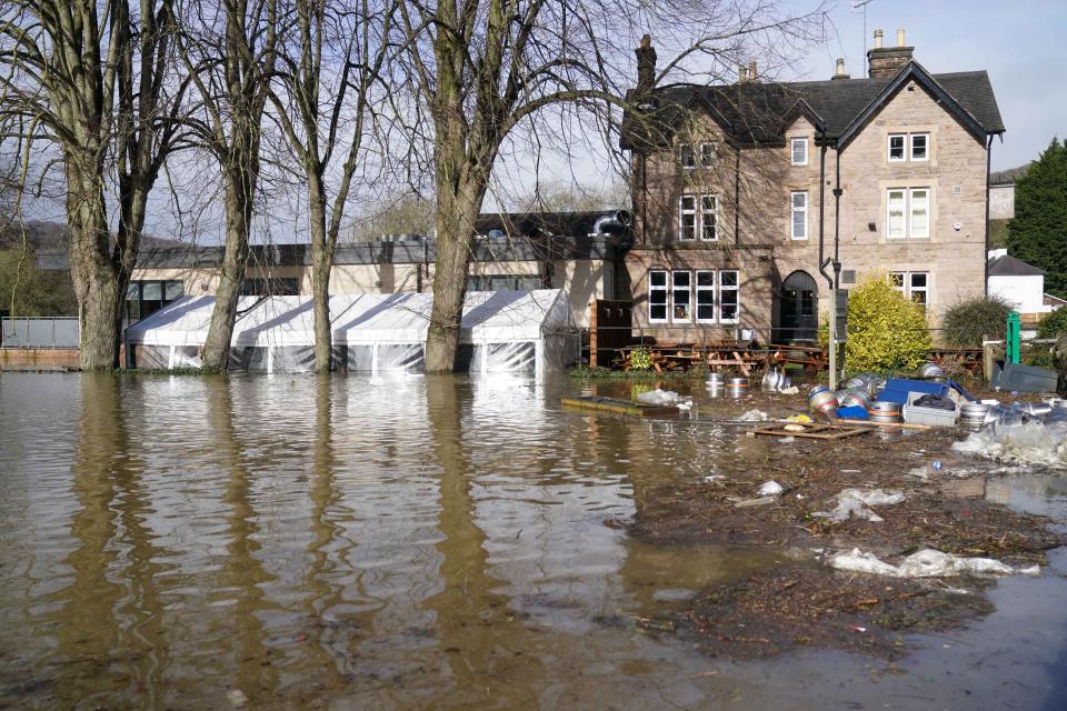 The Hurt Arms pub is surrounded by flood water in Belper, Derbyshire, as Britons have been warned to brace for strengthening winds and lashing rain as Storm Franklin moved in overnight, just days after Storm Eunice destroyed buildings and left 1.4 million homes without power. Picture date: Monday February 21, 2022.