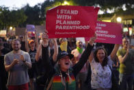 FILE - Supporters of abortion rights chant slogans outside a Planned Parenthood clinic during a protest in West Hollywood, Calif., Friday, June 24, 2022. The Supreme Court's ruling allowing states to regulate abortion has set off a mad travel scramble across the country to direct patients to states that still allow the procedure. (AP Photo/Jae C. Hong, File)