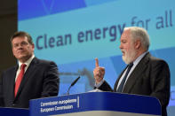 European Commission Vice-President Maros Sefcovic (L) and Commissioner Miguel Arias Canete hold a news conference on Clean Energy package in Brussels, Belgium November 30, 2016. REUTERS/Eric Vidal