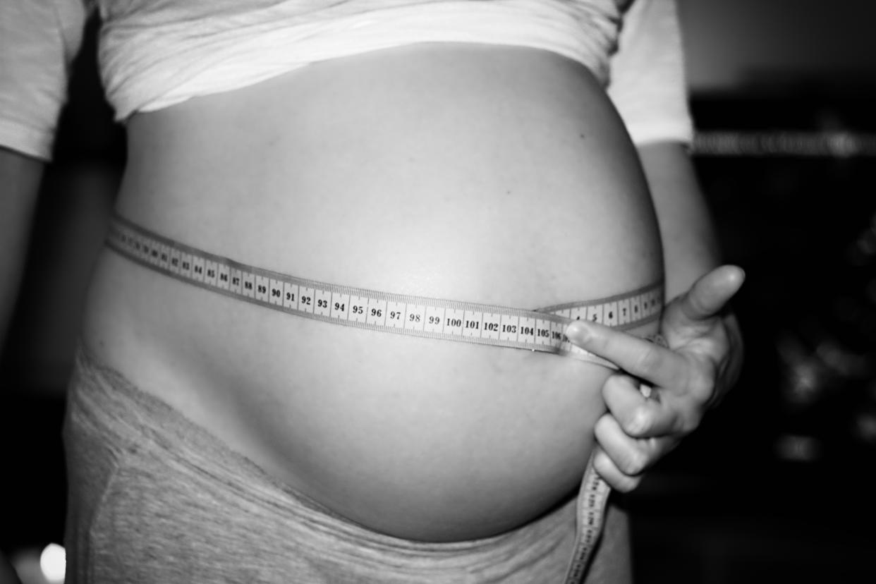 Women are being shamed about the size of their pregnancy bump [Photo: Getty]