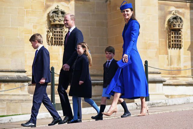 <p>Yui Mok/WPA Pool/Getty</p> Prince William and Princess Kate and their children, from left, Prince George, Princess Charlotte and Prince Louis at Easter Sunday service at Windsor Castle in April 2023