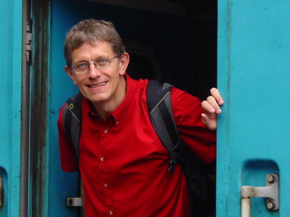 Going east: Simon Calder aboard the Rossiya train on the Trans-Siberian Railway in 2004 (Ed Venner)