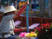 A flower-seller displays her ware