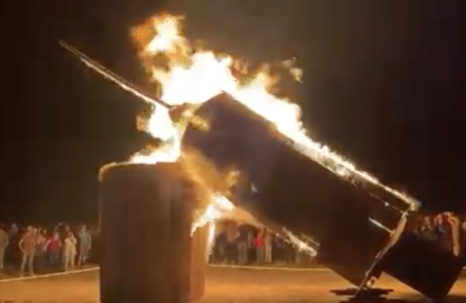 <p>A giant effigy of a syringe is burned in Utah demonstration </p> (Facebook/Eric Moutsos)