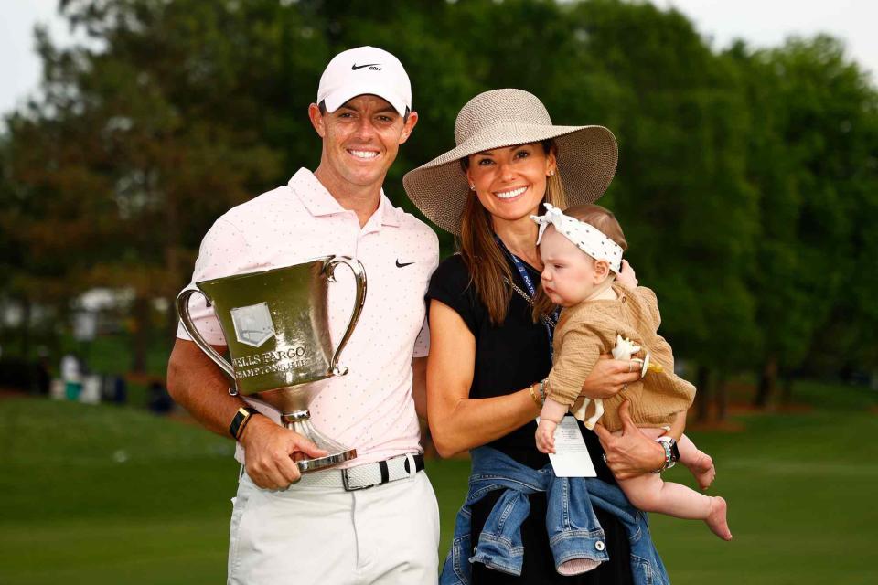 Jared C. Tilton/Getty Rory McIlroy, Erica Stoll and daughter Poppy at the 2021 Wells Fargo Championship in Charlotte, North Carolina