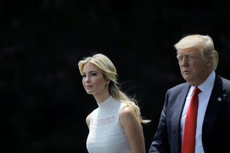 FILE PHOTO: U.S. President Donald Trump and his daughter Ivanka Trump walk on the South Lawn of the White House in Washington, DC, U.S., before their departure to Milwaukee, Wisconsin, June 13, 2017. REUTERS/Carlos Barria/File Photo