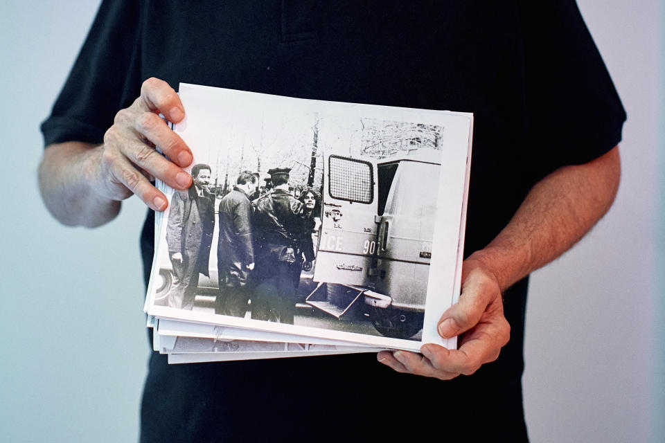 During an interview inside the Stonewall National Monument Visitor Center, Friday, June 21, 2024, in New York, social activist Mark Segal poses for a photograph while holding a picture that shows his arrest during the 1969 Stonewall Inn riot. The Stonewall National Monument's visitor center opens on Friday, June 28, the anniversary of the 1969 rebellion that helped reshape LGBTQ+ life in the United States in the ensuing decades. (AP Photo/ Andres Kudacki)