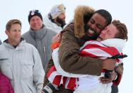 <p>Gold medallist Shaun White of the U.S. hugs a friend competes. REUTERS/Mike Blake </p>