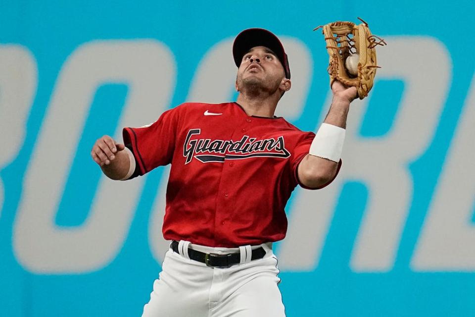 Cleveland Guardians right fielder Ramon Laureano catches a fly ball hit by Toronto Blue Jays' Whit Merrifield during the eighth inning of a baseball game Tuesday, Aug. 8, 2023, in Cleveland. (AP Photo/Sue Ogrocki)