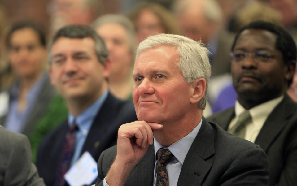 University of New Hampshire president Mark Huddleston listens during a forum with The University of New Hampshire and community colleges on how to increase the number of Science, Technology, Engineering, and Mathematics graduates in New Hampshire to meet workforce needs. , Tuesday, Nov. 27, 2012 in Manchester, N.H. (AP Photo/Jim Cole)