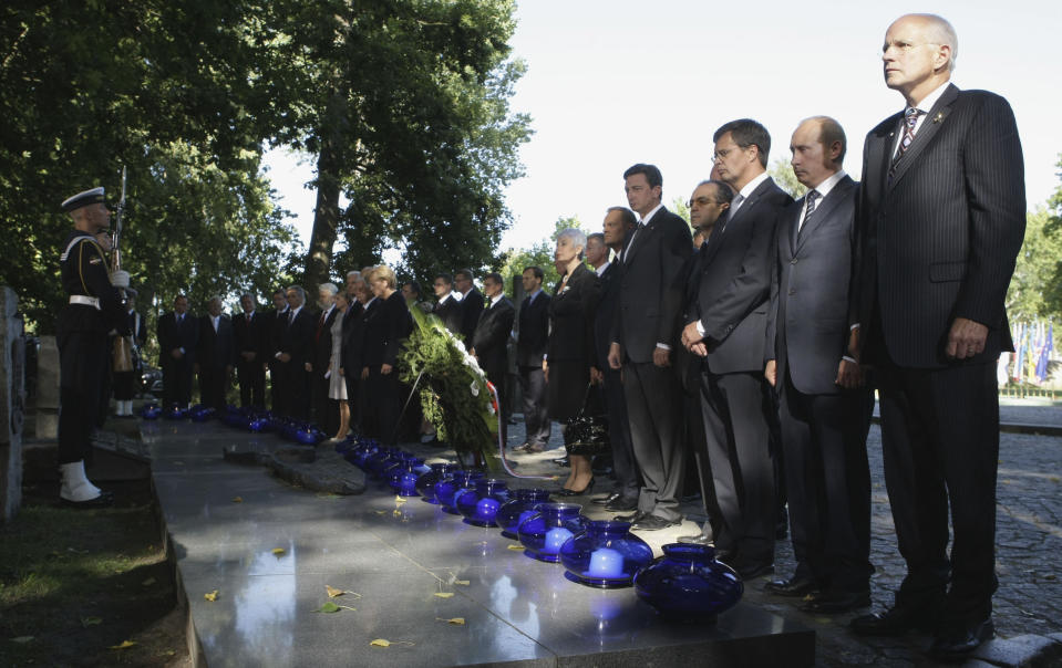 FILE - In this Tuesday, Sept. 1, 2009 file photo, Russian Prime Minister Vladimir Putin, second right, and other European leaders take part in a memorial ceremony at the Cemetery of Defenders of Westerplatte outside Gdansk, northern Poland to mark the 70th anniversary of the beginning of World War II. Polish authorities have refused to invite a Russian delegation to a commemoration ceremony marking the 80th anniversary of the outbreak of World War II. Krzysztof Szczerski, an aide to the Polish president, said on Wednesday March 20, 2019, in comments carried by the Polish news agency PAP that Russia has not been invited to the events in September due to its aggressive actions in Ukraine. (AP Photo/RIA-Novosti, Alexei Druzhinin, pool, file)