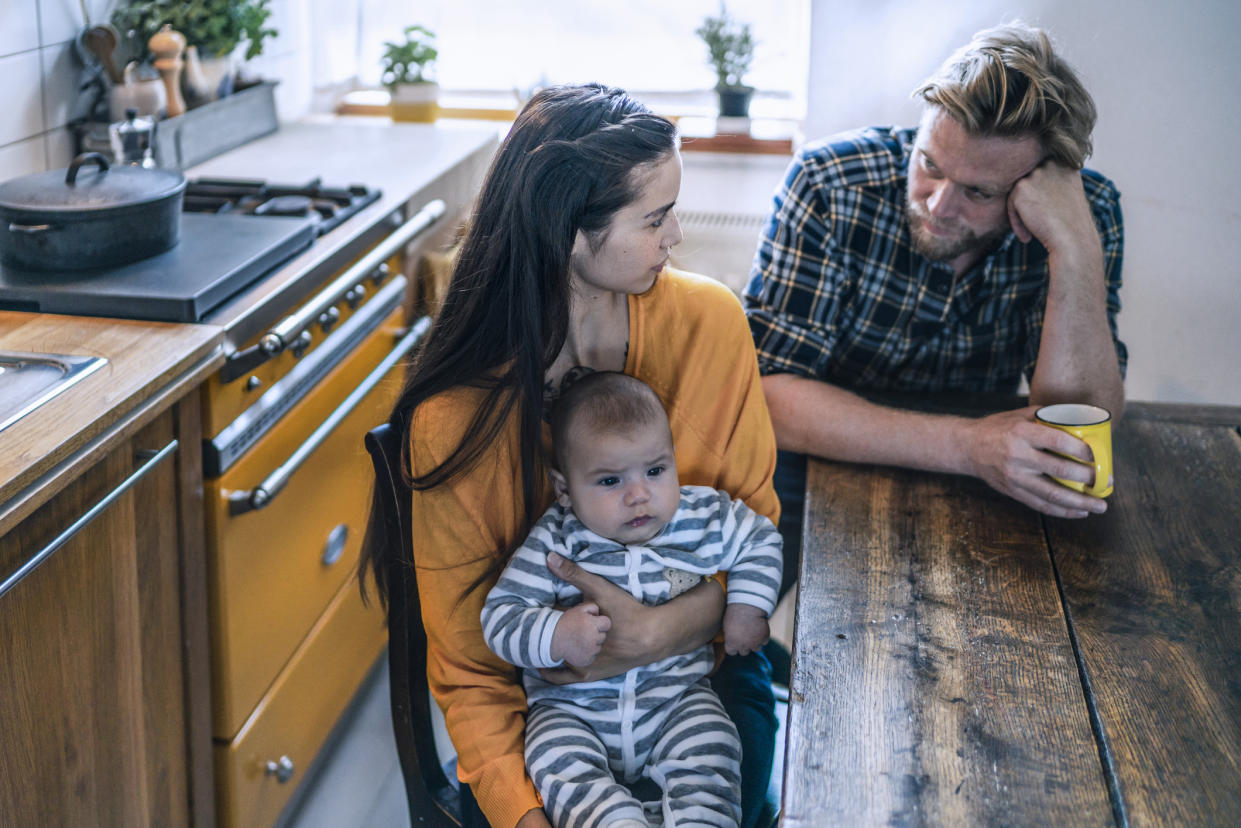 Couple with their new baby which can impact mental health. (Getty Images)