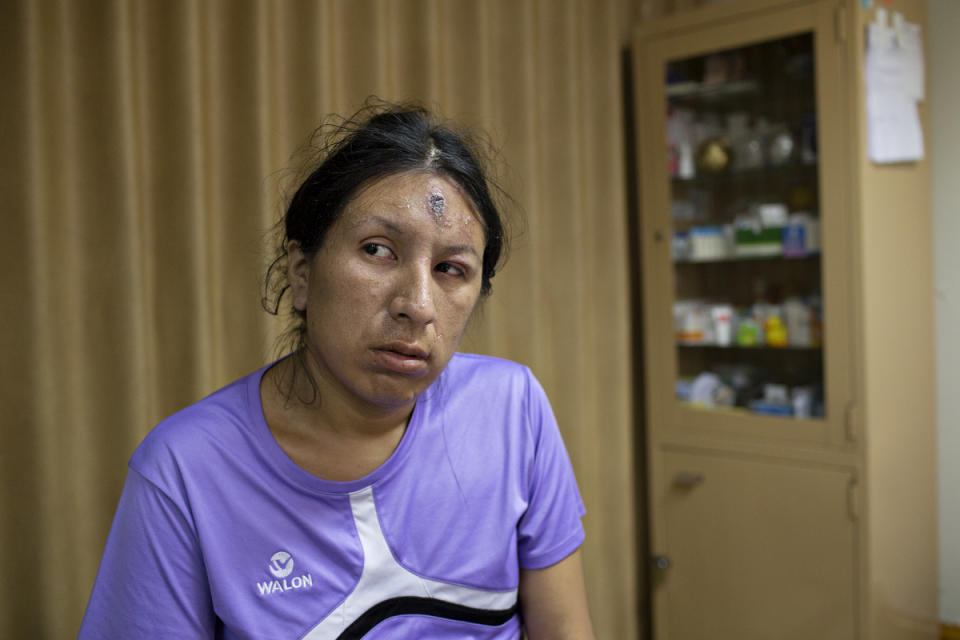 <p>Tamara waits in a doctor’s office to get treatment for a scab that has appeared on her forehead. That day the doctor told me that this occurs in people who are infected with HIV. (Photo: Danielle Villasana) </p>