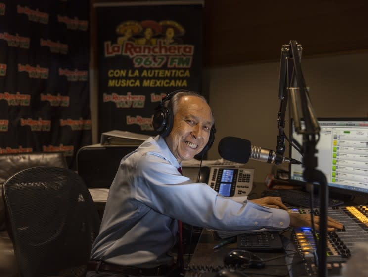 Burbank, CA - August 12: Ruben Miranda hosts his "El Rancho de Vicente Fernandez" radio show, which he has done for the past 21 years, a one-hour radio show that airs every weekday at noon on La Ranchera 96.7 at Estrella Media headquarters in Burbank Thursday, Aug. 12, 2021. (Allen J. Schaben / Los Angeles Times)