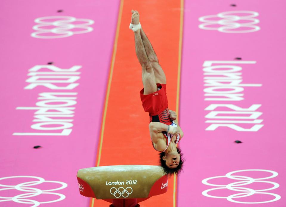 Japan's Kohei Uchimura competes on the vault during the Artistic Gymnastics team qualification at the North Greenwich Arena, London, on day one of the London 2012 Olympics.. Picture date: Saturday July 28, 2012. Photo credit should read: Anthony Devlin/PA Wire. Editorial Use Only