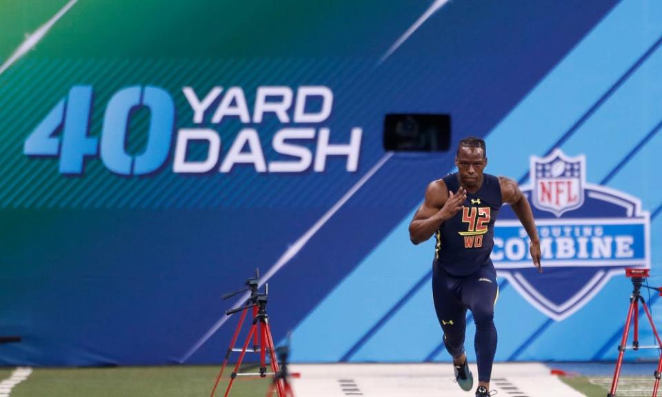 Mar 4, 2017; Indianapolis, IN, USA; Washington Huskies wide receiver John Ross runs the 40 yard dash during the 2017 NFL Combine at Lucas Oil Stadium. Mandatory Credit: Brian Spurlock-USA TODAY Sports