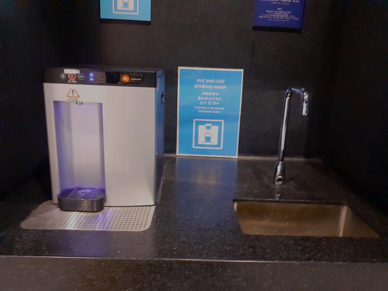 A picture shows taps for drinking water in Helsinki airport.