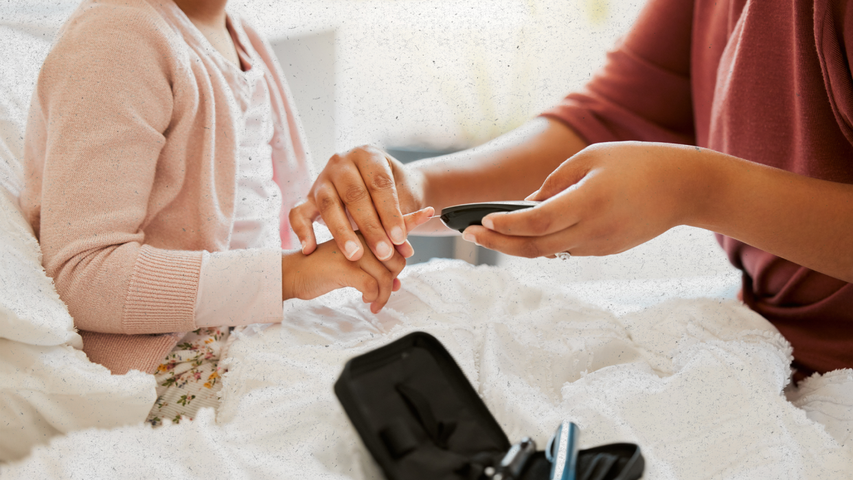 Child with diabetes getting blood sugar checked.