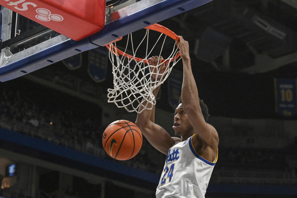 Pittsburgh forward William Jeffress (24) dunks against Notre Dame during the second half of an NCAA college basketball game, Saturday, Feb. 3, 2024, in Pittsburgh. (AP Photo/Barry Reeger)