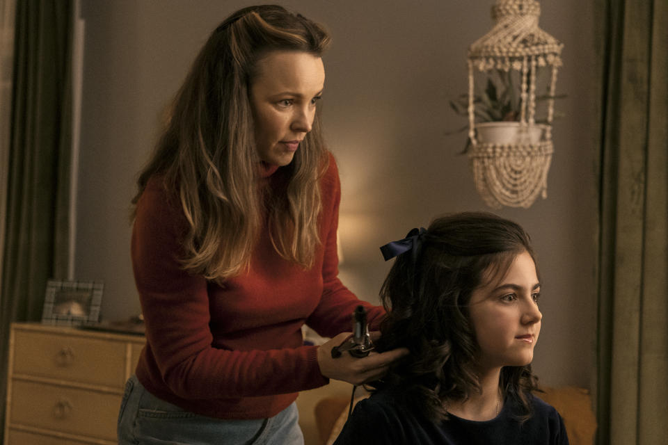 This image released by Lionsgate shows Rachel McAdams, left, and Abby Ryder Fortson in a scene from "Are You There God? It's Me, Margaret." (Dana Hawley/Lionsgate via AP)