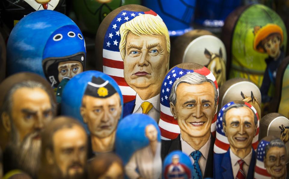 FILE - In this file photo taken on Thursday, March 2, 2017, Matryoshkas, traditional Russian wooden dolls, including a doll of U.S. President Donald Trump, top, are displayed for sale in Moscow, Russia. From Moscow, the U.S. election looks like a contest between "who dislikes Russia most," according to Kremlin spokesman Dmitry Peskov. Russian President Vladimir Putin is frustrated with President Donald Trump's failure to deliver on his promise to fix ties between the countries. But Democratic challenger Joe Biden does not offer the Kremlin much hope either. (AP Photo/Alexander Zemlianichenko, File)