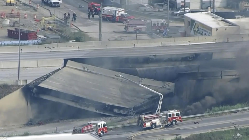 This screen grab from video provided by WPVI-TV/6ABC shows the collapsed section of I-95 with fire trucks on the scene in Philadelphia, Sunday, June 11, 2023. (WPVI-TV/6ABC via AP)