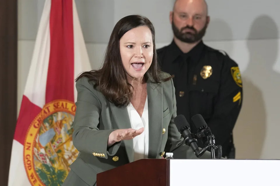 FILE - Florida Attorney General Ashley Moody speaks at a news conference, Jan. 26, 2023, in Miami. A stripper and the strip club where she worked have sued Moody to stop enforcement of a new state law took effect on Monday, July 1, 2024, that prohibits adult entertainment businesses from employing people who are under age 21, claiming it violates their First Amendment rights. (AP Photo/Marta Lavandier, File)