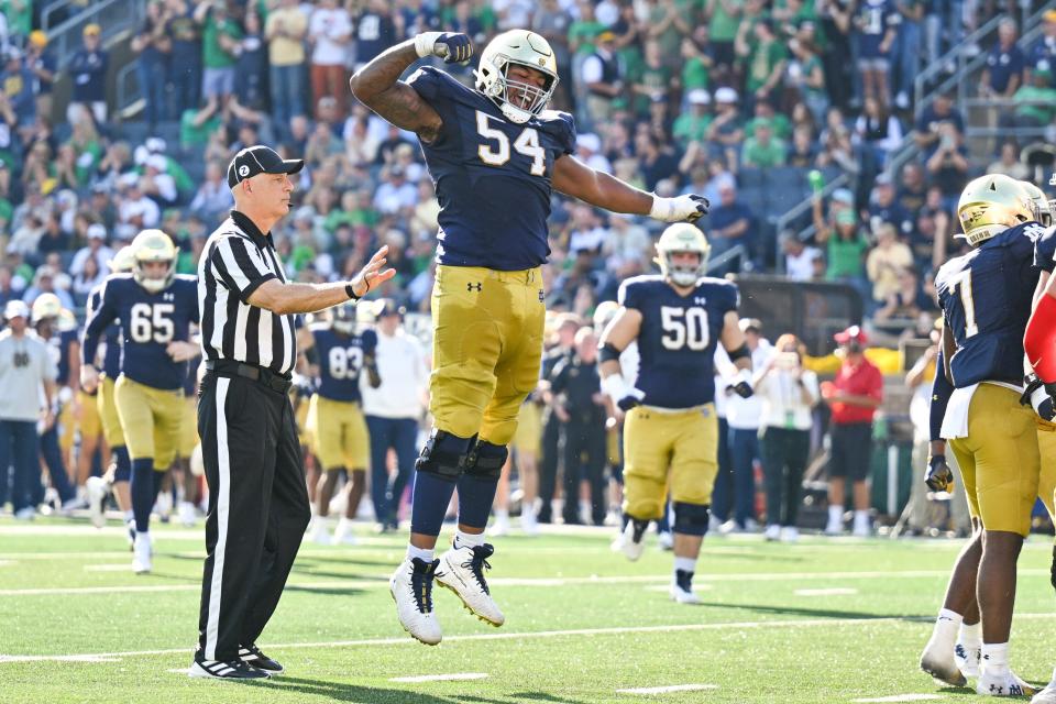 Oct 22, 2022; South Bend, Indiana, USA; Notre Dame Fighting Irish offensive lineman Blake Fisher (54) celebrates after a Notre Dame touchdown in the second quarter against the UNLV Rebels at Notre Dame Stadium.