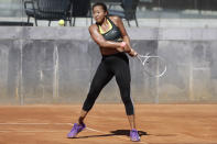 Japan's Naomi Osaka returns the ball during a training session at the Italian Open tennis tournament, in Rome, Monday, May 10, 2021. (AP Photo/Gregorio Borgia)