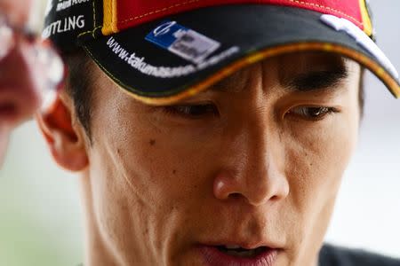 May 24, 2019; Indianapolis, IN, USA; Indycar driver Takuma Sato discuses the day during Carb Day for the 103rd Running of the Indianapolis 500 at Indianapolis Motor Speedway. Mandatory Credit: Thomas J. Russo-USA TODAY Sports