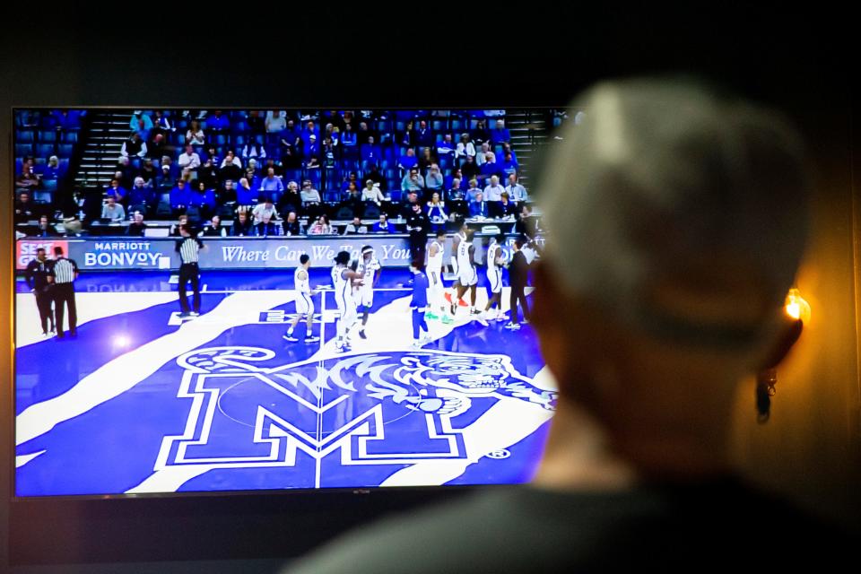 Memphis basketball head coach Penny Hardaway watches his team play Alabama State from a private room at Owners Box Sports Grill in Lakeland, Tenn., on Friday, November 17, 2023. Hardaway couldn’t coach the team because of a three-game NCAA suspension he had to serve for recruiting violations.