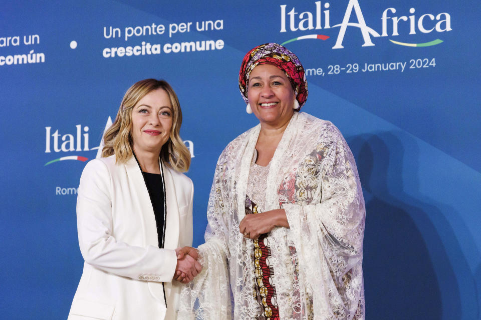 Italian Premier Giorgia Meloni, left, welcomes UN Deputy Secretary-General Amina Mohammed on the occasion of an Italy - Africa summit, in Rome, Monday, Jan. 29, 2024. Meloni opened a summit of African leaders on Monday aimed at illustrating Italy's big development plan for the continent that her government hopes will stem migration flows and forge a new relationship between Europe and Africa. (Roberto Monaldo/LaPresse via AP)