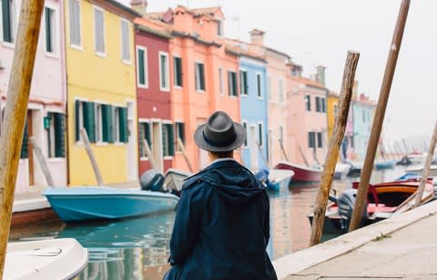 Man in hat by canal - Credit: Getty