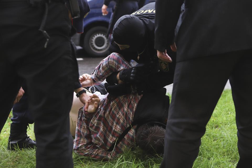 Police detain a student during a protest against presidential election results in Minsk, Belarus, Tuesday, Sept. 1, 2020. Several hundred students on Tuesday gathered in Minsk and marched through the city center, demanding the resignation of the country's authoritarian leader after an election the opposition denounced as rigged. Many have been detained as police moved to break up the crowds. (AP Photo)