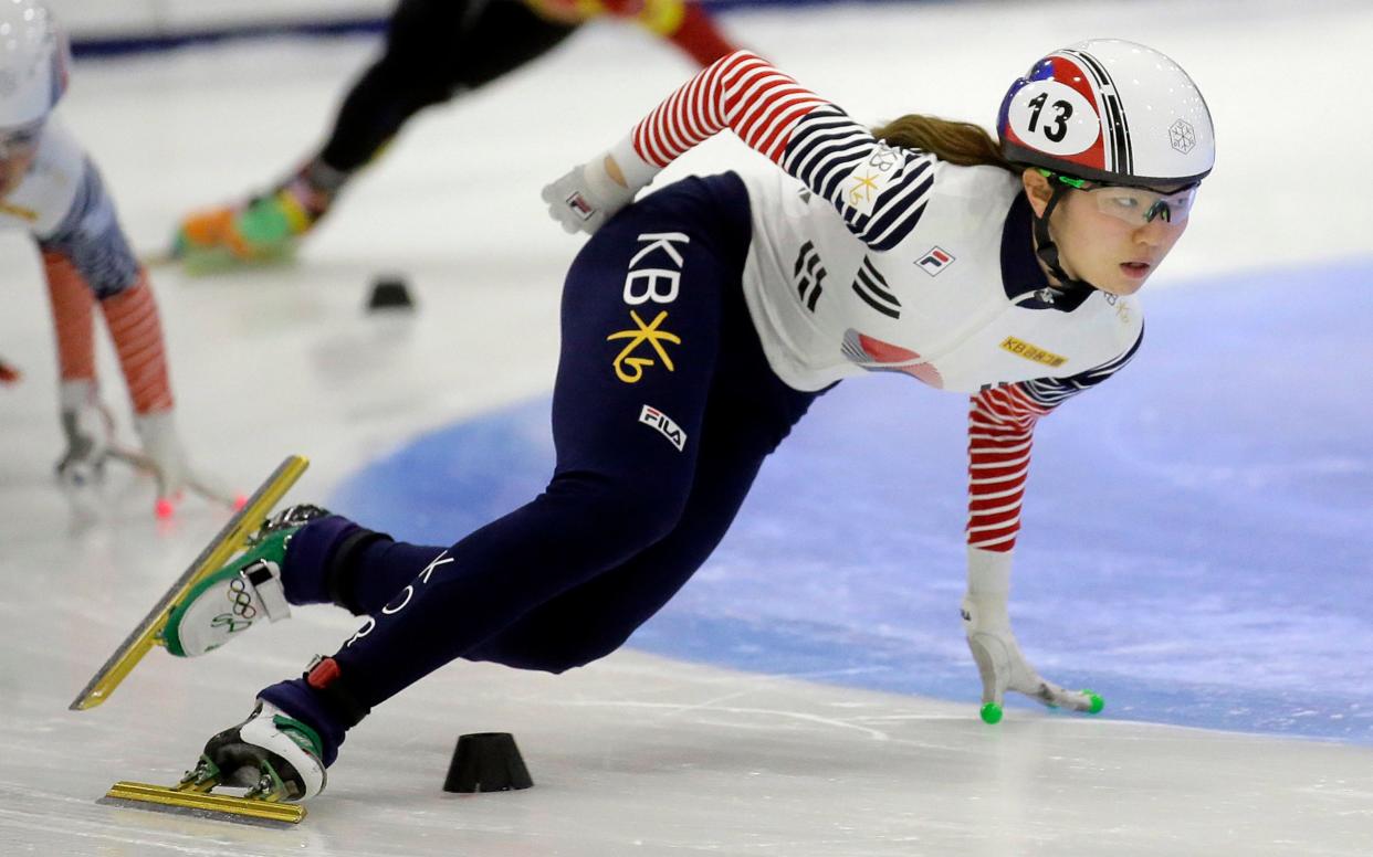 First-place finisher Shim Suk-hee, from South Korea, races during the women's 1,500-meter finals at the 2016 World Cup short track speedskating event in Utah - Rick Bowmer/AP