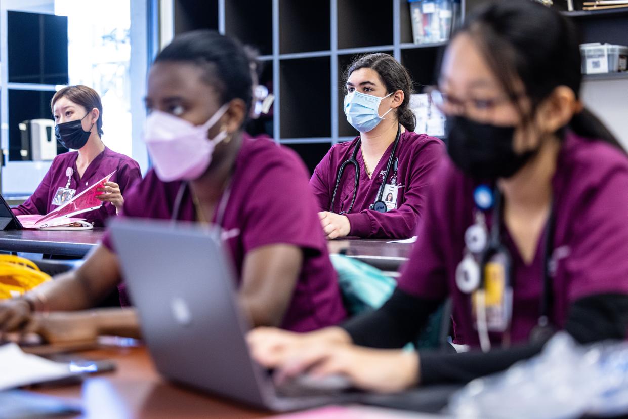 Elliana Tenenbaum listens to a lecture at Arizona State University's Edson College of Nursing and Health Innovation.