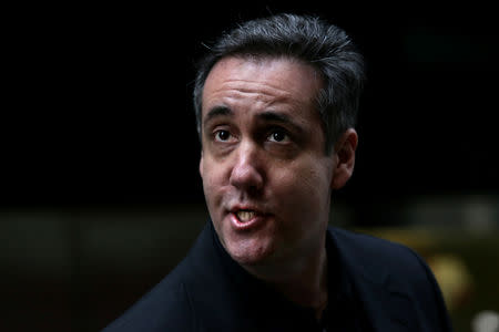 Michael Cohen, the former lawyer for U.S. President Donald Trump engages with a member of the press while walking back to his apartment in Manhattan in New York City, New York, U.S., May 4, 2019. REUTERS/Yana Paskova