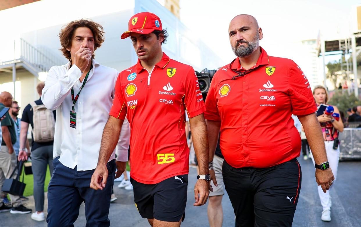 Carlos Sainz nd Scuderia Ferrari walks to the TV media pen after the Azerbaijan Grand Prix