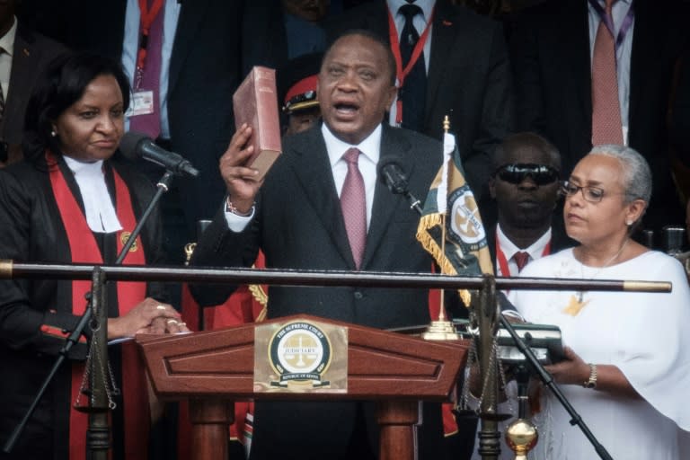 Kenyatta took the oath of office and vowed to unite the country behind him -- but political chaos and division remain deep