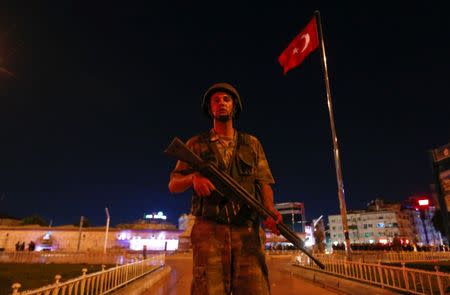 A Turkish military stands guard near the Taksim Square in Istanbul, Turkey, July 15, 2016. REUTERS/Murad Sezer - RTSI72G