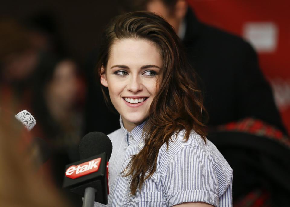 Cast member Kristen Stewart smiles as she is interviewed at the premiere of the film "Camp X-Ray" during the 2014 Sundance Film Festival, on Friday, Jan. 17, 2014, in Park City, Utah. (Photo by Danny Moloshok/Invision/AP)