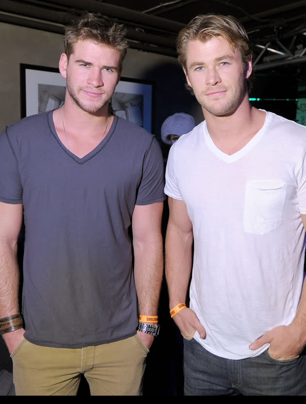 Chris Hemsworth and Liam Hemsworth photos: Loving the v-necks guys! Copyright [Getty]