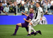 Soccer Football - Serie A - Juventus v Fiorentina - Allianz Stadium, Turin, Italy - April 20, 2019 Fiorentina's Germsan Pezzella scores an own goal and Juventus' second REUTERS/Massimo Pinca