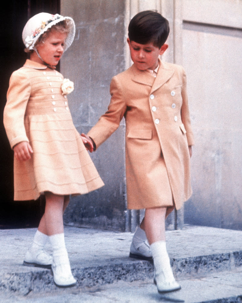 The siblings step out hand-in-hand in matching outfits